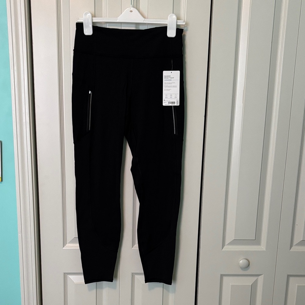 Brand New Athleta Rainer Mesh Tight Black Leggings w/ Zipper Pockets Size Medium